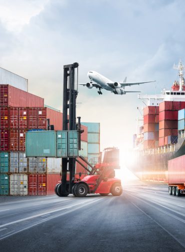 Business logistics and transportation concept of containers cargo freight ship and cargo plane in shipyard at dramatic blue sky, logistic import export and transport industry background